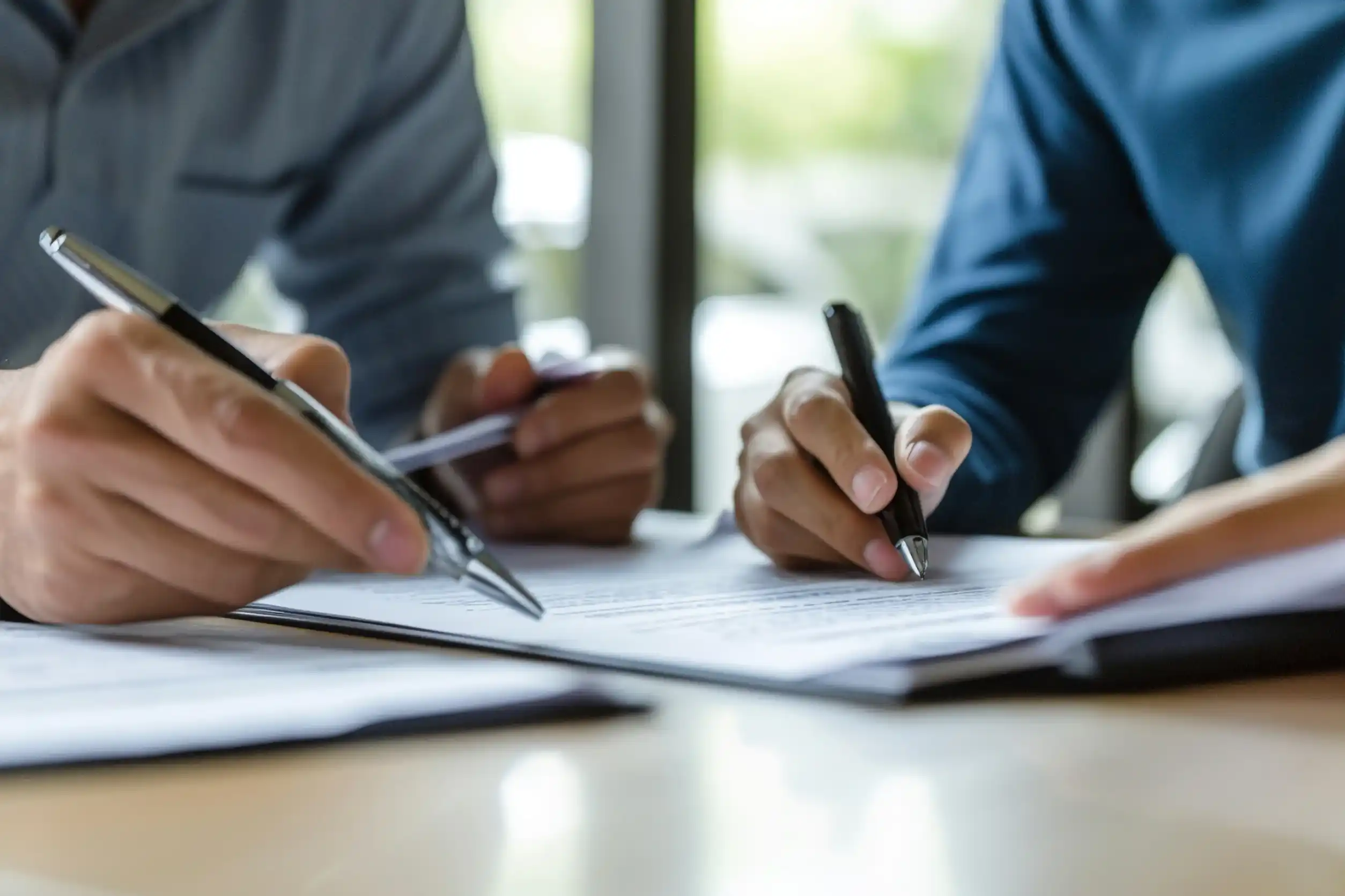 Businessman and businesswoman meeting to discuss the situation on the market